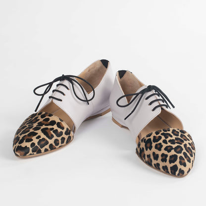 Pink Tulip calf hair leather flats by Indigenous featuring sleek, stylish design and comfortable flat shoes for everyday wear.