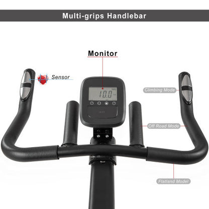 Teal Simba indoor cycling bike with 4-way adjustable handlebar and seat, LCD monitor for tracking workout metrics.