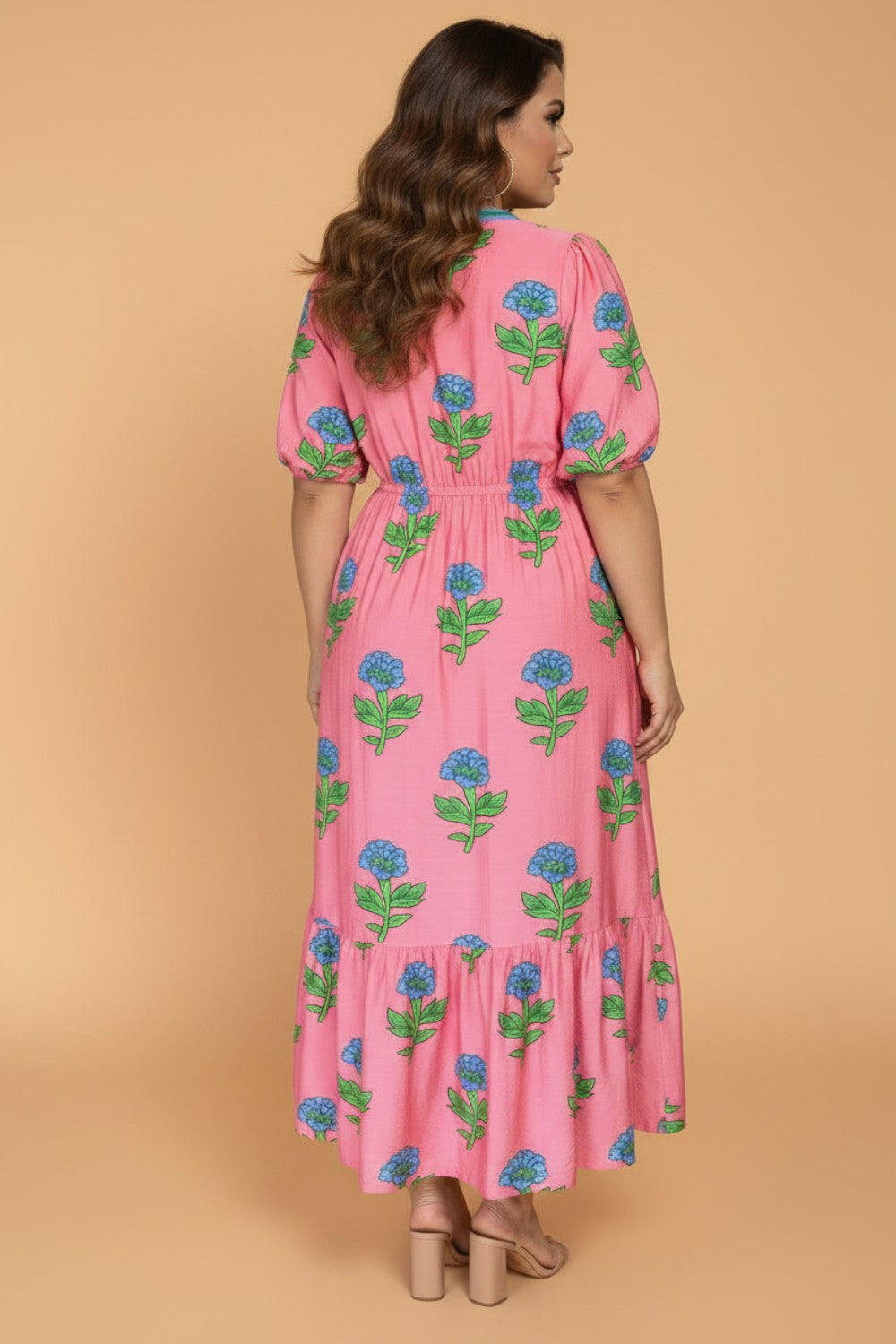 Plus size floral and striped V-neck ruffle maxi dress by Byzantium Bay, featuring a flowing design and vibrant pattern.