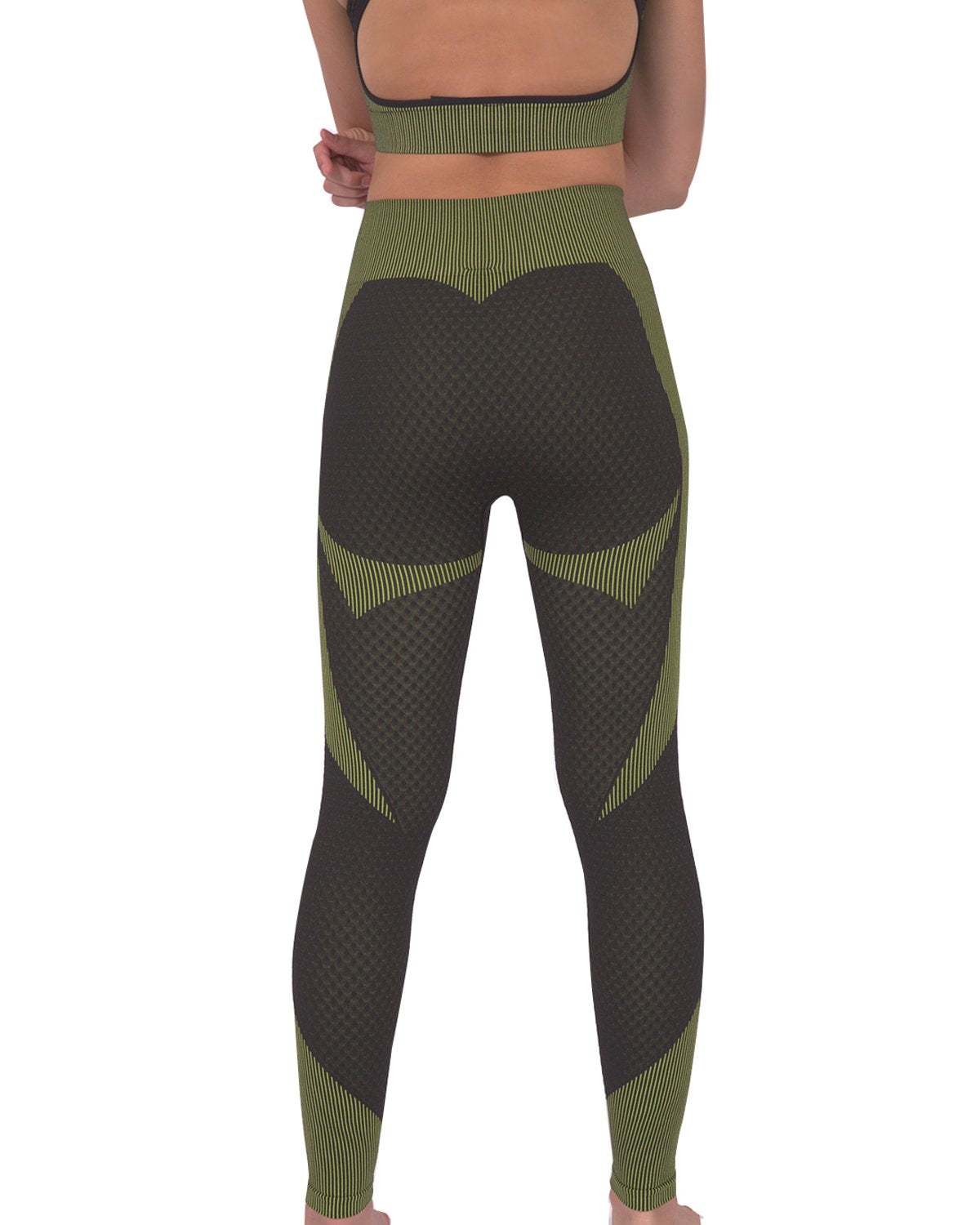 Lazurite Trois Seamless Activewear leggings in black with green accents, showing a close-up of the stretchy, seamless fabric.
