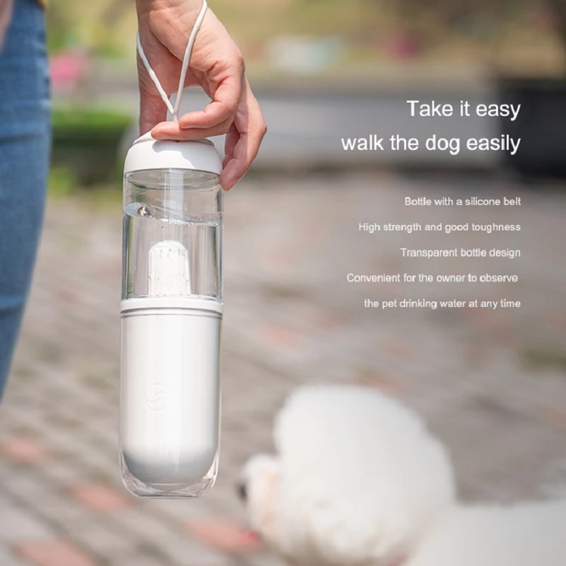 Lilac Milo outdoor pet water dispenser for dogs and cats, portable water bottle with built-in water tray for travel.