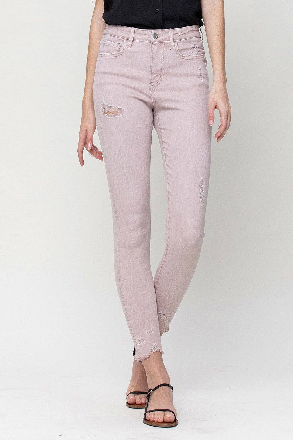 Ochre Ismene Ververt Peony distressed jeans with faded and ripped details, showcasing a casual, trendy denim style.