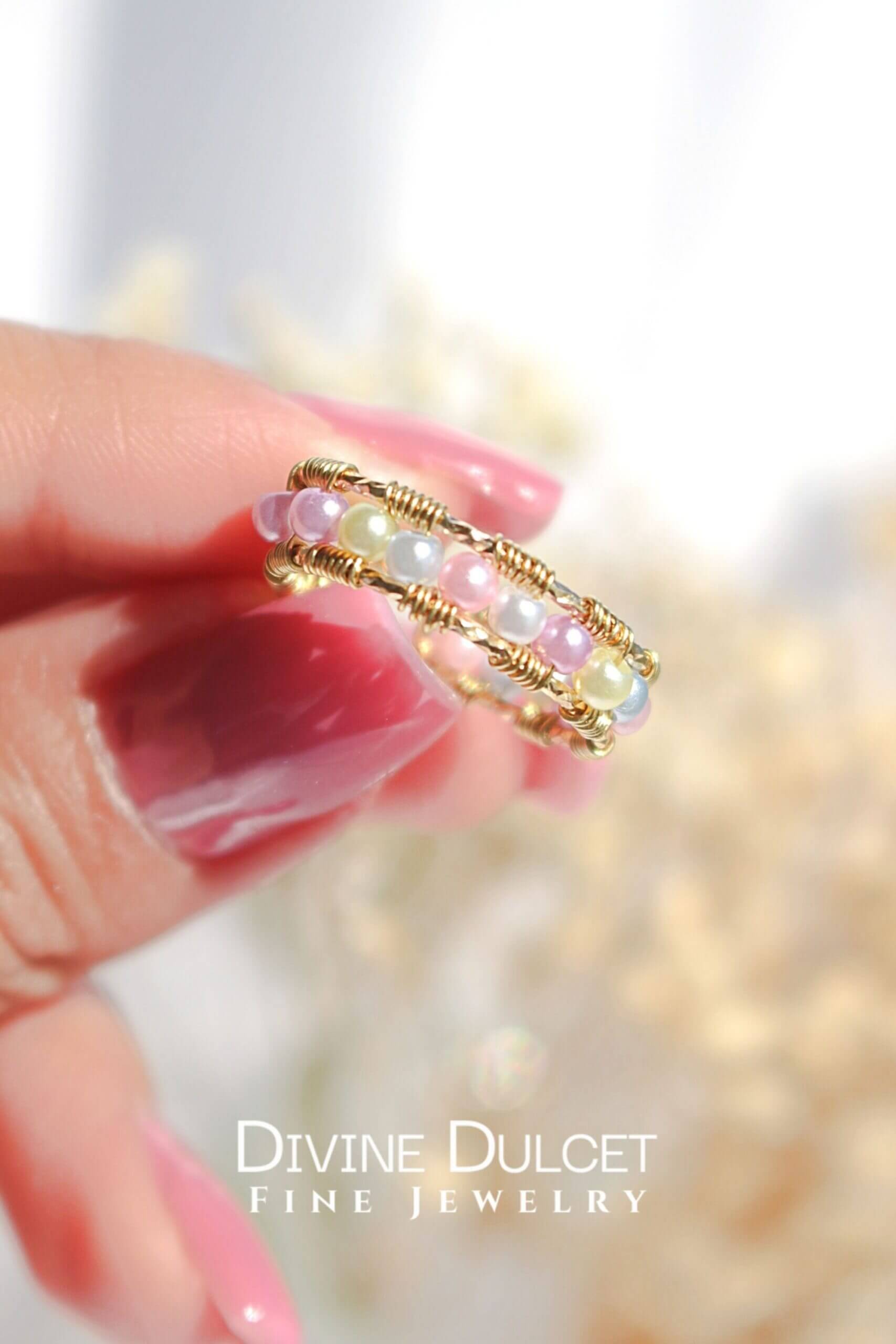 18K pastel rainbow hand-wired band ring by Ultramarine Birch, featuring colorful rainbow gemstones on a delicate gold band.