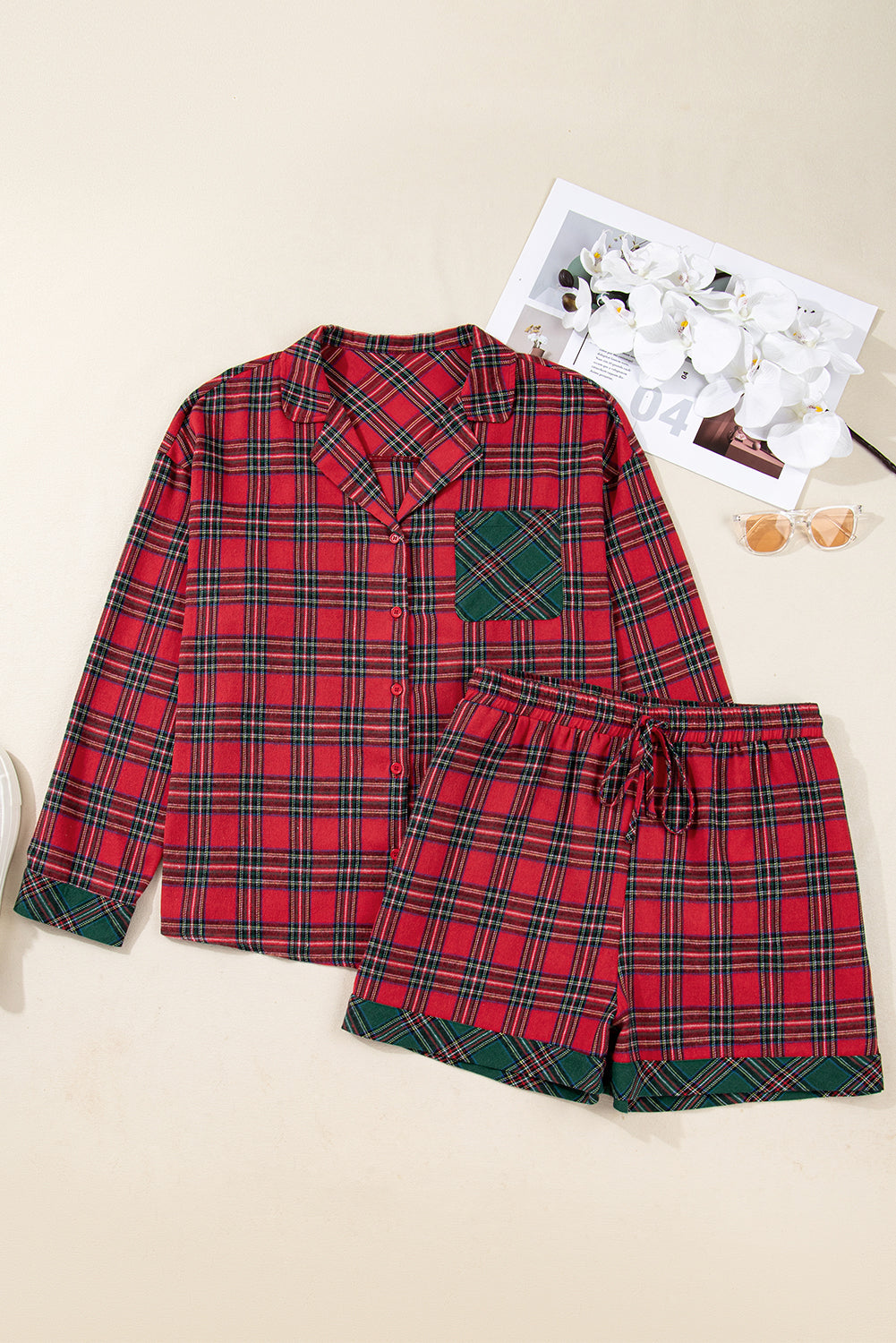 Plus size Christmas plaid shirt and shorts pajama set by Byzantium Bay, featuring festive red and green plaid fabric.