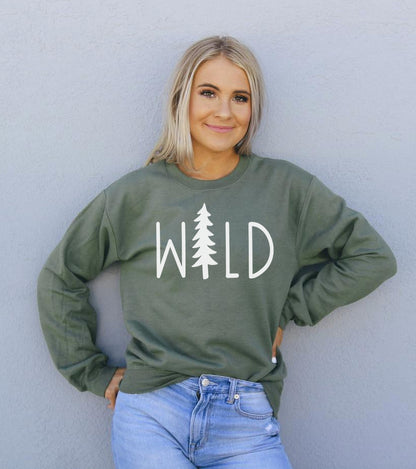 Agate Wild Sweatshirt, cozy sweater with a bold wild print, displayed on a hanger against a neutral background.