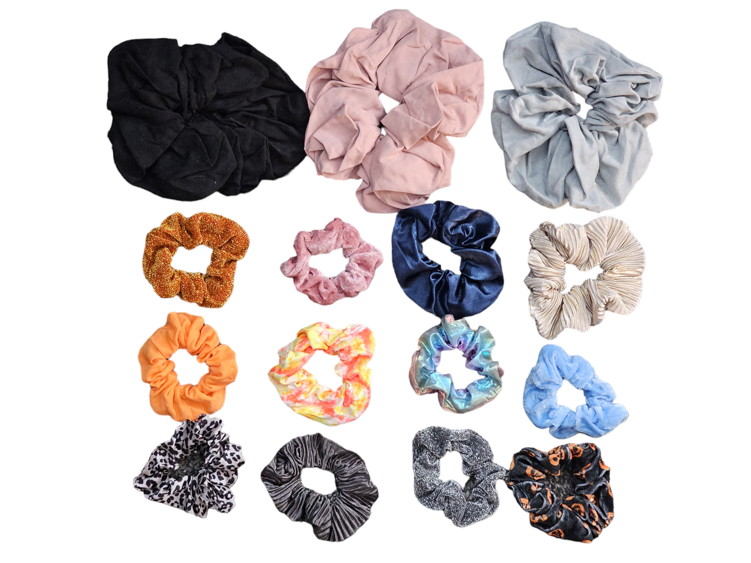 Set of 15 assorted designer hair scrunchies in trendy patterns by Sky Pandion, showcasing colorful fabric and elastic bands.