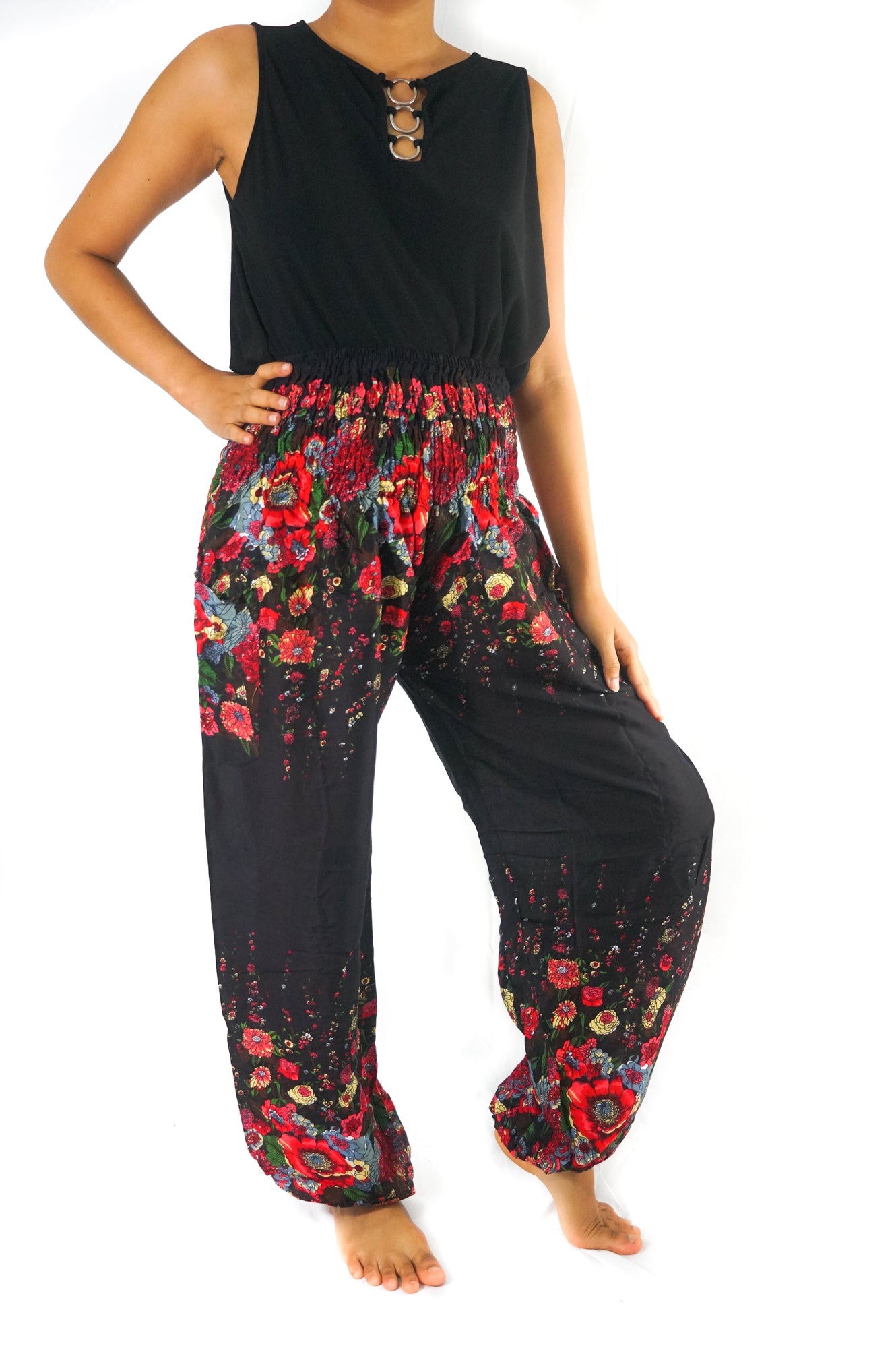 Black floral boho pants for women by Tan Smokey, featuring a relaxed fit and hippie-inspired design, ideal for yoga or casual wear.