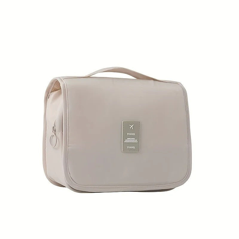 Coffee Broadleaf Ultimate Hanging Toiletry Bag with multiple compartments, shown hanging open with travel-sized bottles inside.