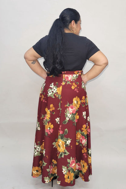 Women’s high waist maxi skirt with belt from Burgundy Daisy, flowing fabric, styled for casual or formal wear.