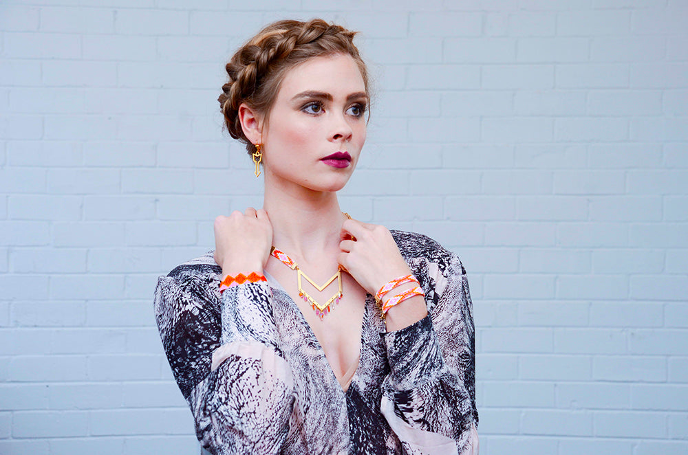 Yellow Athena Twilight Bracelet featuring pink, orange, blue beads with gold accents, stylish jewelry for everyday wear.