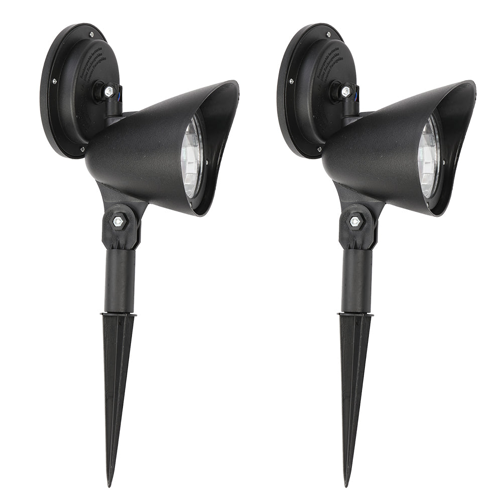 Two Lilac Milo solar landscape LED spotlights illuminating a garden pathway, highlighting outdoor garden lighting.