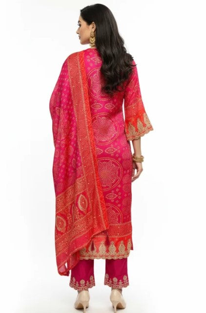 Pink and red Bandhej suit set with dupatta for women by Viridian Caeneus, featuring traditional Indian embroidery and vibrant colors.