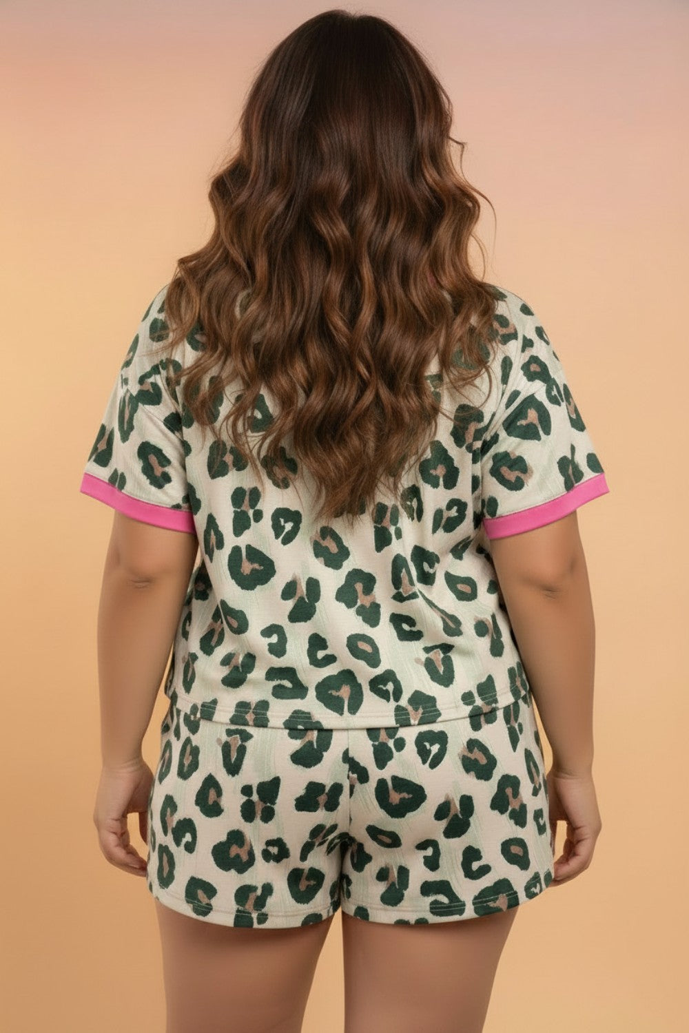 Plus size leopard colorblock top and high waist shorts for women, Byzantium Bay clothing, featuring bold animal print and comfortable fit.