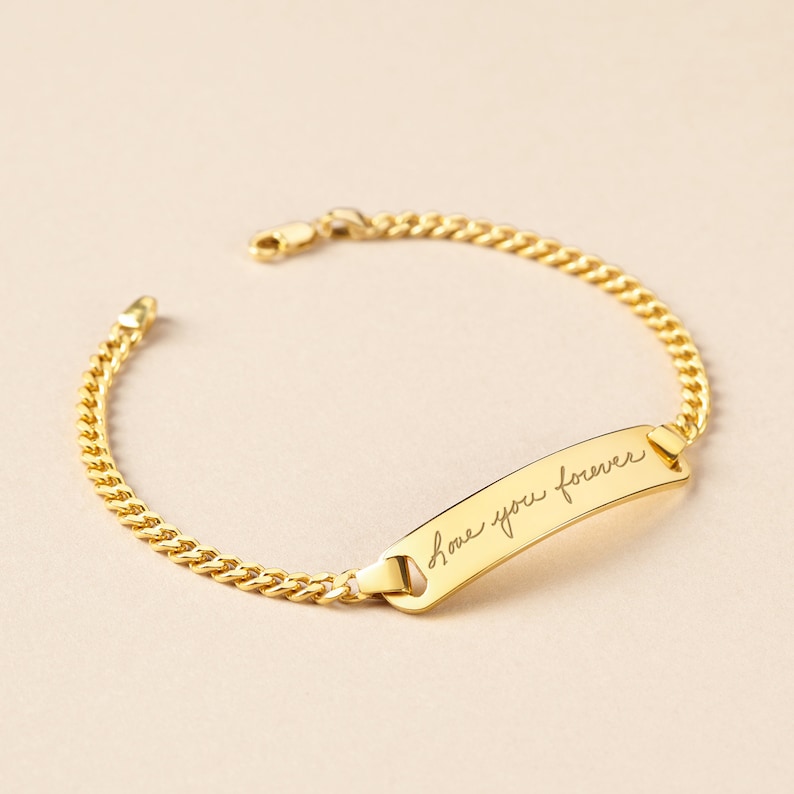 Green Millie handwriting bracelet for women featuring a signature design, showcasing a delicate metal chain and personalized charm.