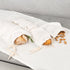 Off-white linen bread bag by Biotite, kitchen storage accessory with a soft, natural fabric design for fresh bread preservation.