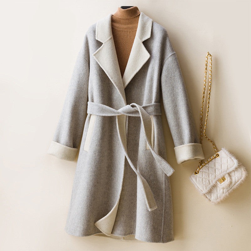 Ladies wool double-faced coat by Carmine Juneberry, showcasing classic elegance and cozy warmth in a stylish jacket.