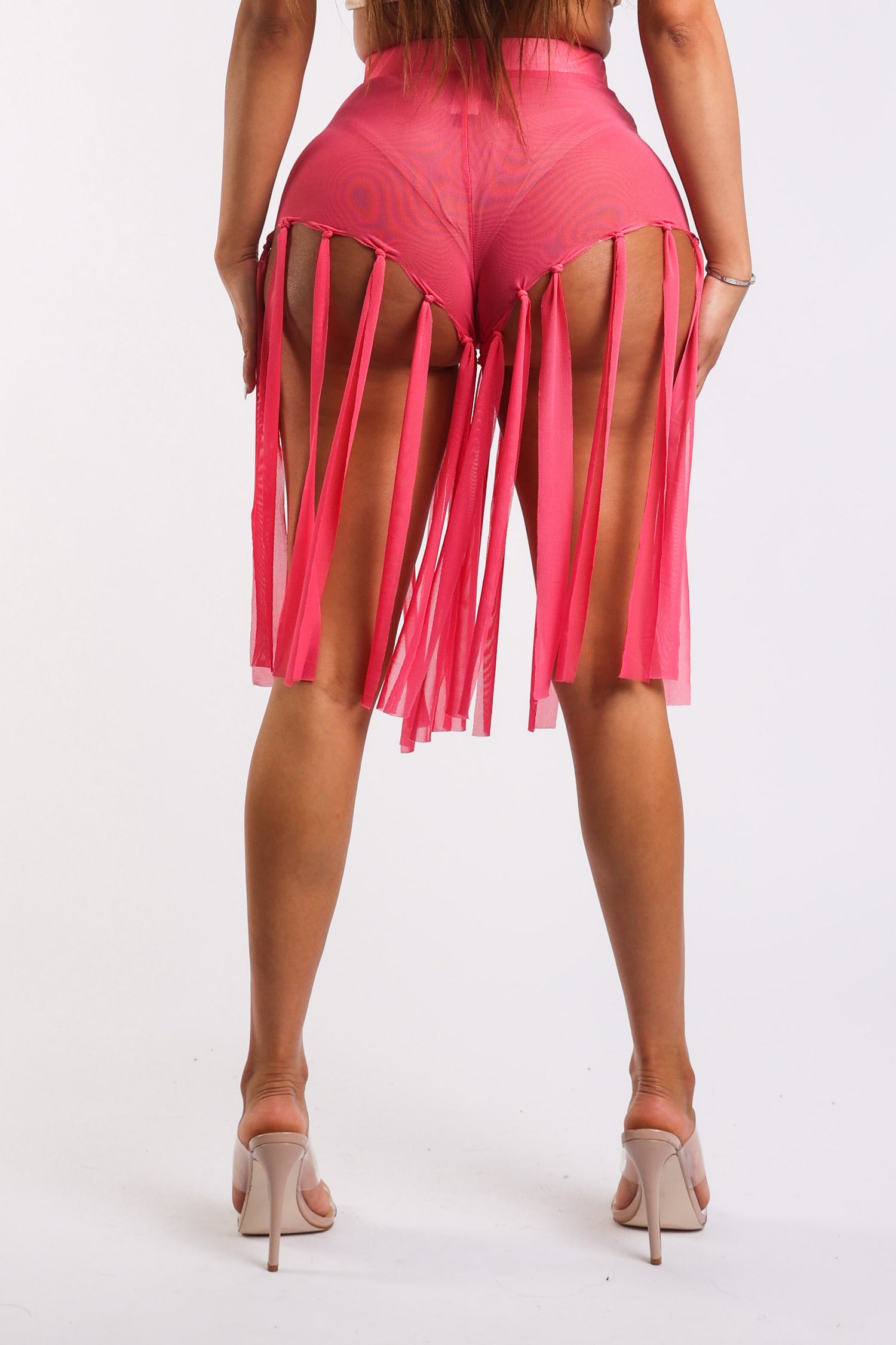 Pink fringed mesh shorts by Puce Juniper, stylish and sexy party-ready shorts with layered fringe details.