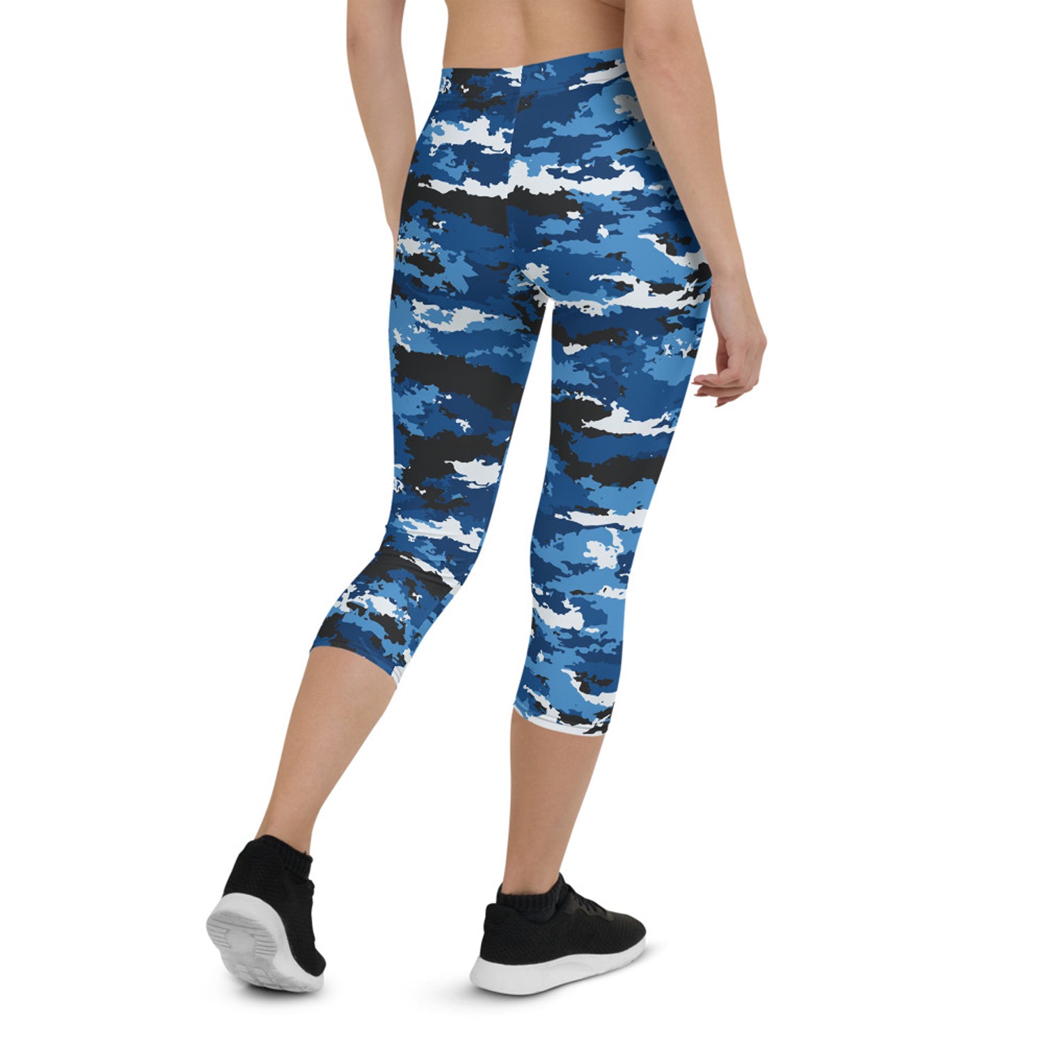 Blue camo sports Capri leggings by Maroon Sooty, showing a close-up of the camouflage pattern and stretchy athletic fabric.