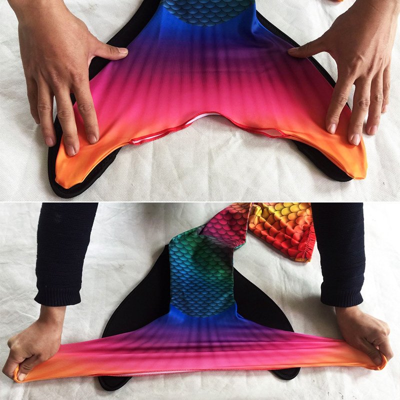 Fuchsia Molly mermaid swimsuit towel featuring vibrant mermaid scale pattern and soft, absorbent fabric for pool or beach use.