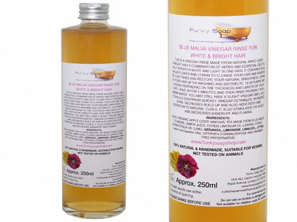 White hair vinegar rinse in a glass bottle, natural handmade haircare product by Tan Abderus, 250ml bottle on a neutral background.