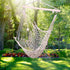Lilac Milo hanging rope air chair swing for home and garden, featuring a cozy sky-blue fabric seat with sturdy ropes and wooden support.