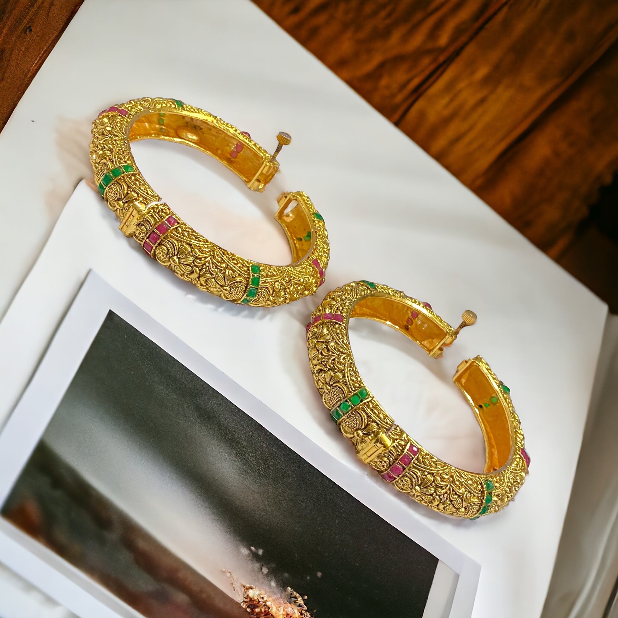 Gold-plated traditional bangles by Gray Poseidon, showcasing elegant, handcrafted bracelet designs with intricate detailing.