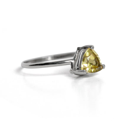 Sterling silver Lemon Topaz trillion solitaire ring with a faceted yellow gemstone and sleek band design.