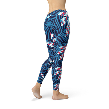Maroon Sooty blue tropical leaf leggings for women featuring vibrant leaf print and comfortable stretchy fabric.