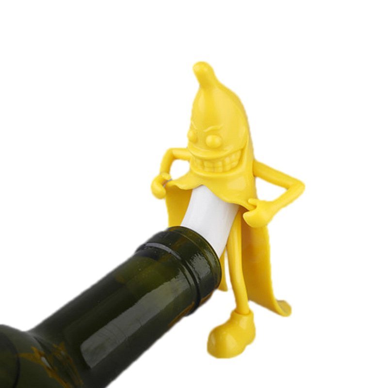 Fuchsia Molly Mr Banana bottle stopper in yellow silicone with banana shape, designed for drinkware sealing and decoration.
