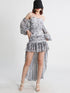 Mauve Ananke asymmetrical mini dress with slash neckline and puff sleeves, solid minimalist design, displayed on a hanger.