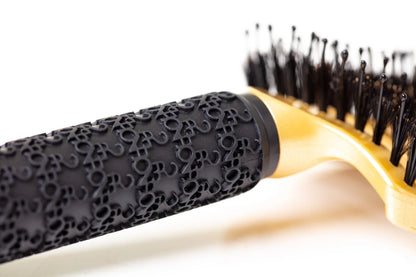 Gold Burgundy Clover hair comb with sleek design, showcasing fine teeth for gentle detangling and styling of hair.