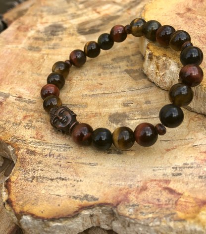 Violet Chaos tiger eye and Buddha gemstone stretch bracelet with polished beads and intricate Buddha charm.