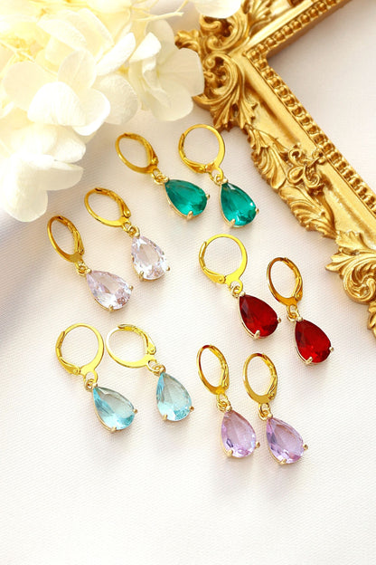 Ultramarine Birch 18K rainbow teardrop hoop earrings featuring colorful, shiny gold earrings with a teardrop design.