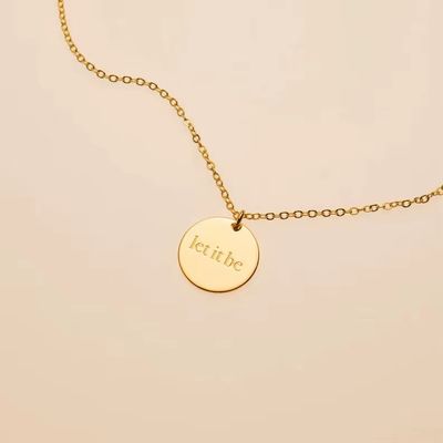 Byzantium Metis "Let It Be" pendant necklace with a silver-toned charm on a delicate chain, stylish and elegant jewelry piece