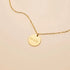 Byzantium Metis "Let It Be" pendant necklace with a silver-toned charm on a delicate chain, stylish and elegant jewelry piece