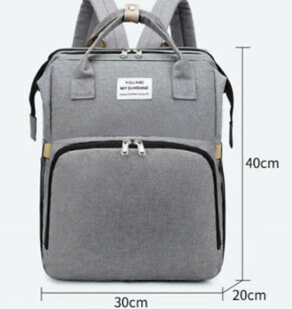 Yellow Pandora stroller diaper bag with integrated baby bed, stylish parent accessories for convenient on-the-go baby care.