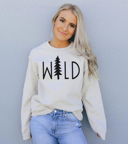 Agate Wild Sweatshirt in cozy, textured fabric with a bold wild animal print, long sleeves, and relaxed fit.