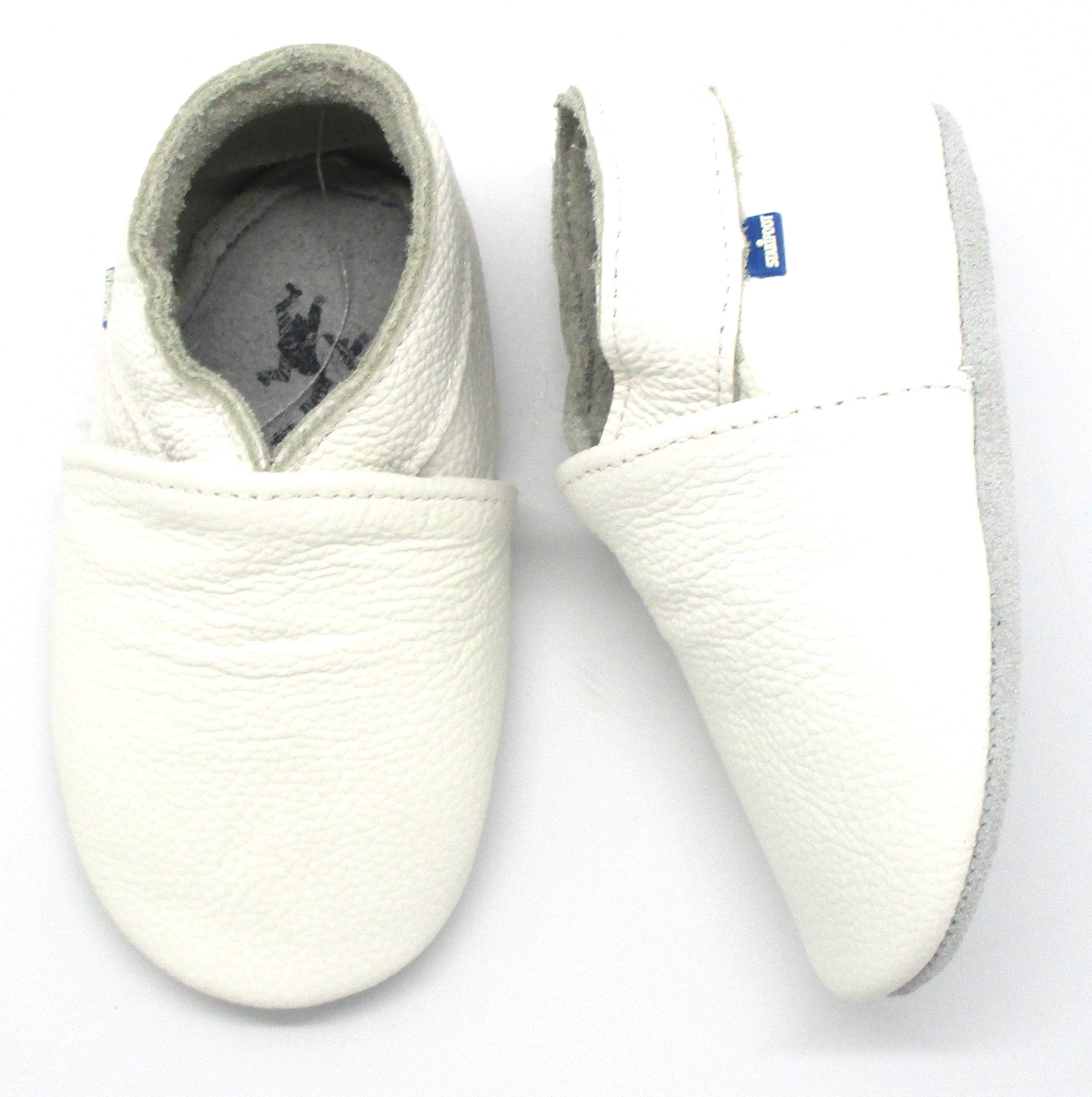 White BABYSOFT 3000 footwear by Puce Selene, showing the soft, comfortable baby shoes with a clean white design.