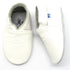 White BABYSOFT 3000 footwear by Puce Selene, showing the soft, comfortable baby shoes with a clean white design.