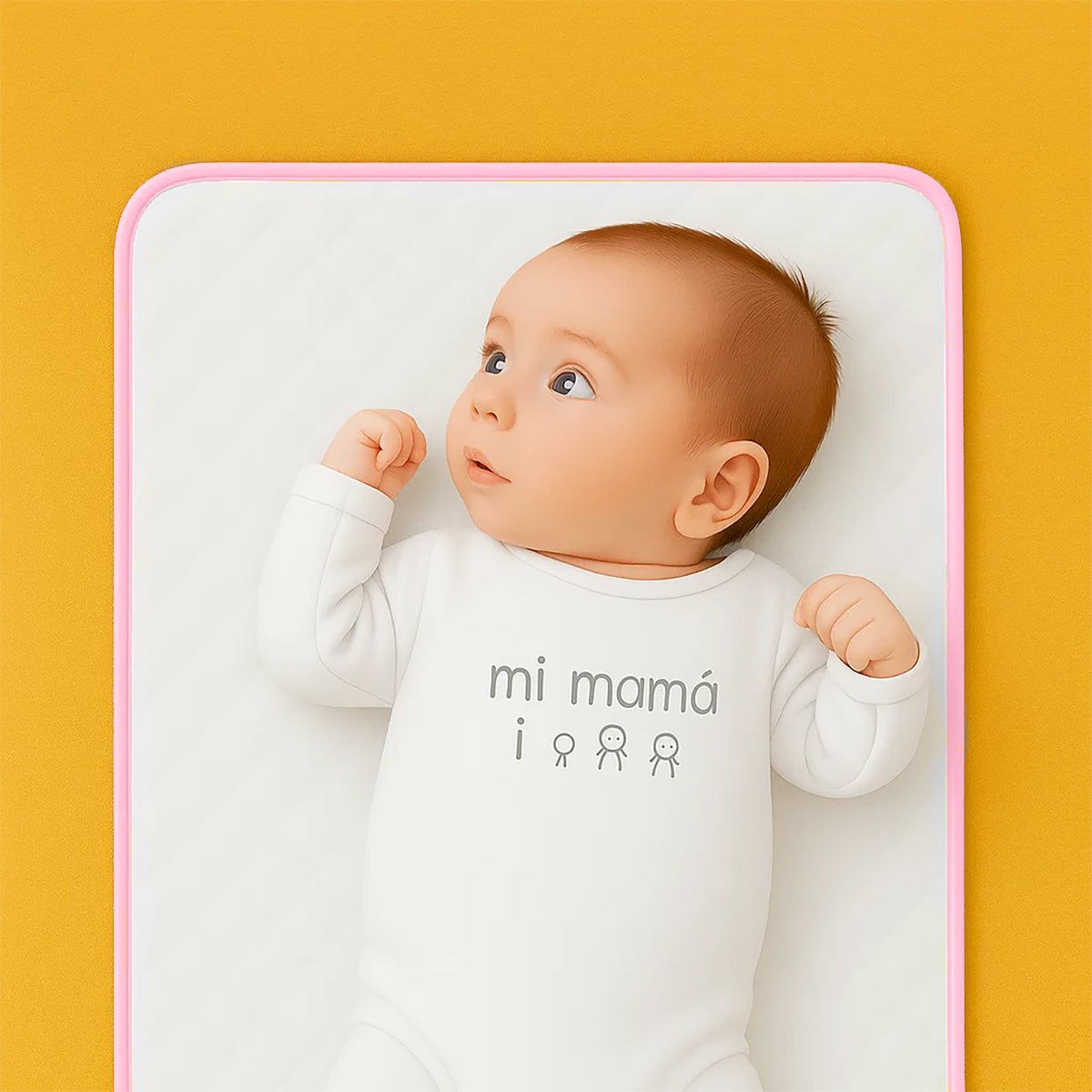 Pink Nomadic changing mat for kids and babies by Chocolate Briseis, showing soft, portable surface with colorful patterns.