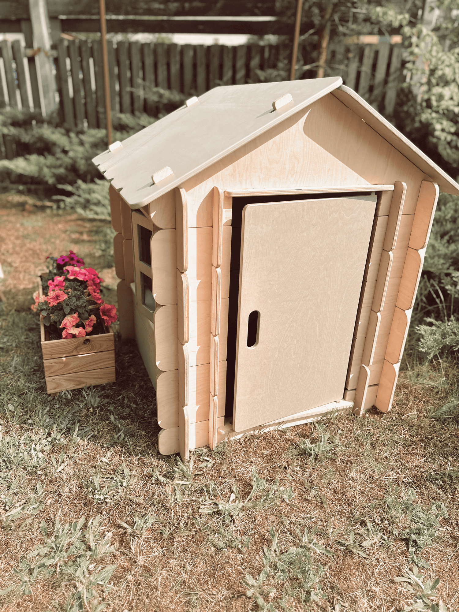 Lavender Arachne Little Bunny Playhouse for kids, colorful wooden furniture with bunny-shaped windows and a cozy design.