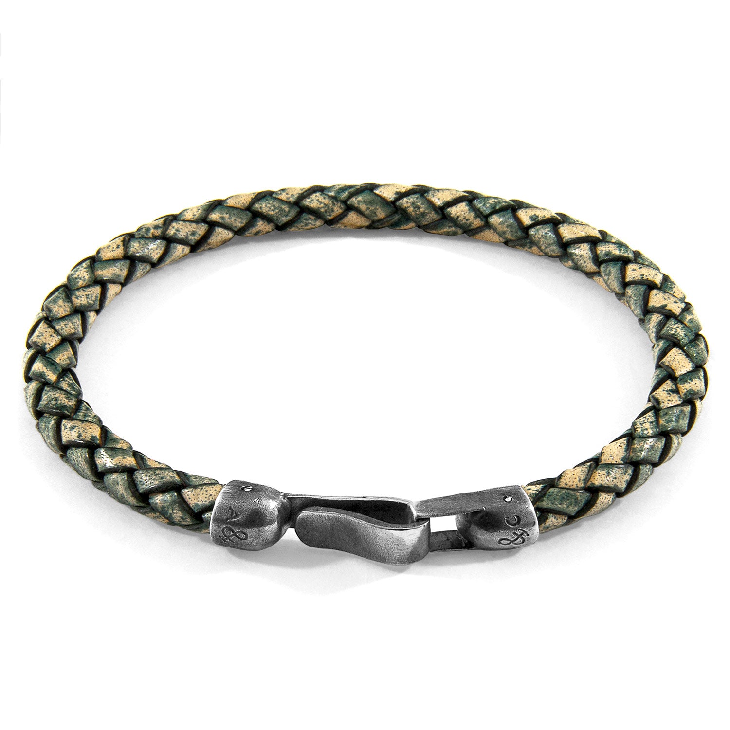 Petrol green Skye silver and braided leather bracelet by Magenta Sooty featuring silver accents and woven leather detailing.