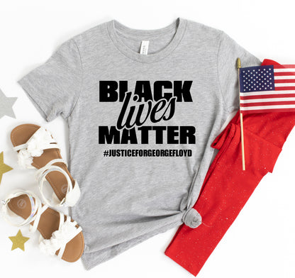 Black Lives Matter T-shirt by Agate featuring bold black and white graphic print on the front.