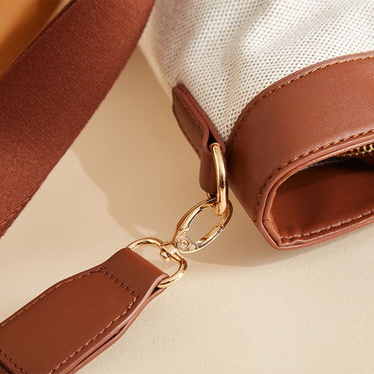 Maroon Chronos canvas tote diaper bag with multiple compartments and handles, designed for parenthood and accessories.