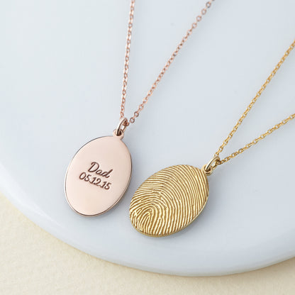 Green Millie fingerprint necklace featuring a personalized memorial thumbprint pendant on a delicate chain.