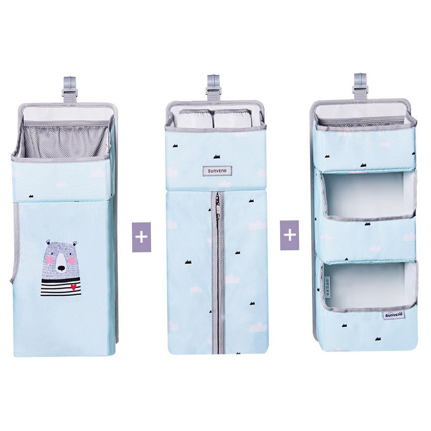 Maroon Chronos baby crib organizer with multiple pockets for nursery decor and baby essentials in a cozy nursery setting.