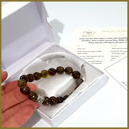 Agate Earthy Tones Bracelet by Maroon Smudge featuring smooth, multicolored agate beads in warm natural shades.