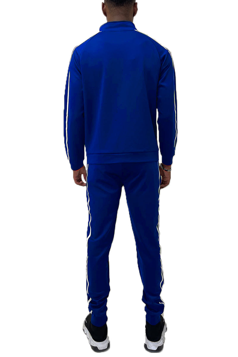 Lime Milo Jordan Tape Track Jacket and Jogger Set, navy blue activewear with white stripe details, displayed on a hanger.