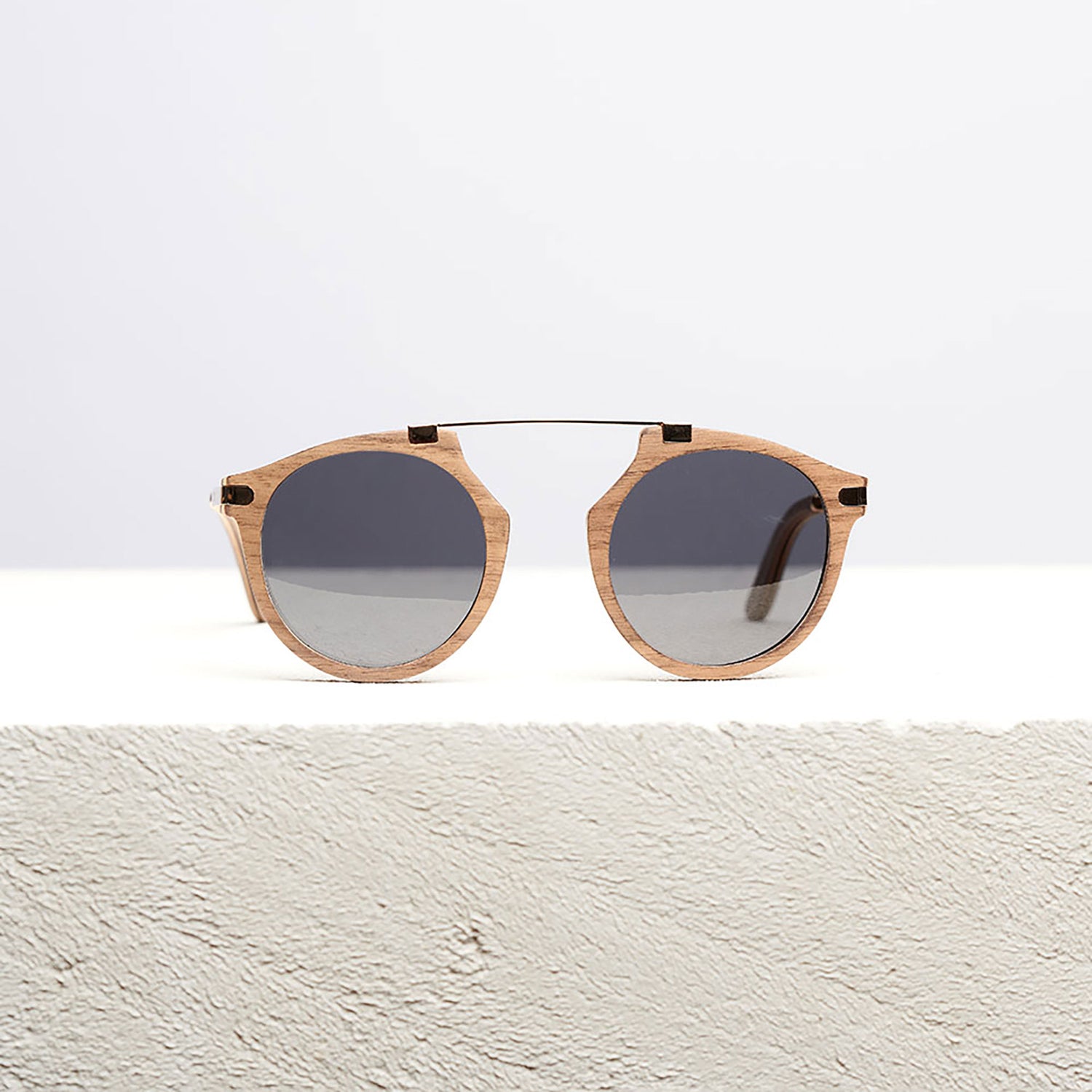 Fuchsia Artemis Santa Monica wooden sunglasses for women with stylish frame and tinted lenses, natural wood finish.
