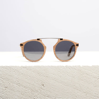 Fuchsia Artemis Santa Monica wooden sunglasses for women with stylish frame and tinted lenses, natural wood finish.